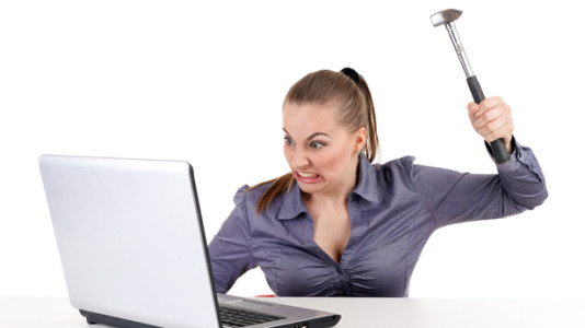 angry-woman-hammer-computer-shutterstock